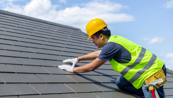 Roof repair worker